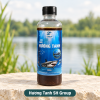 Một chai Hương Tanh SH Group đặt trên bệ đá bên hồ nước ngọt, nhãn sản phẩm SH Group hướng chính diện.