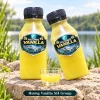 Hương Vanilla SH Group 3 Hai chai Hương Vanilla SH Group, một chai đứng và một chai nghiêng khoảng 30 độ, kèm cốc dung dịch cùng màu.