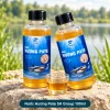 Hai chai Nước Hương Pate SH Group 100ml, một chai đứng và một chai nghiêng khoảng 30 độ, kèm cốc dung dịch cùng màu.