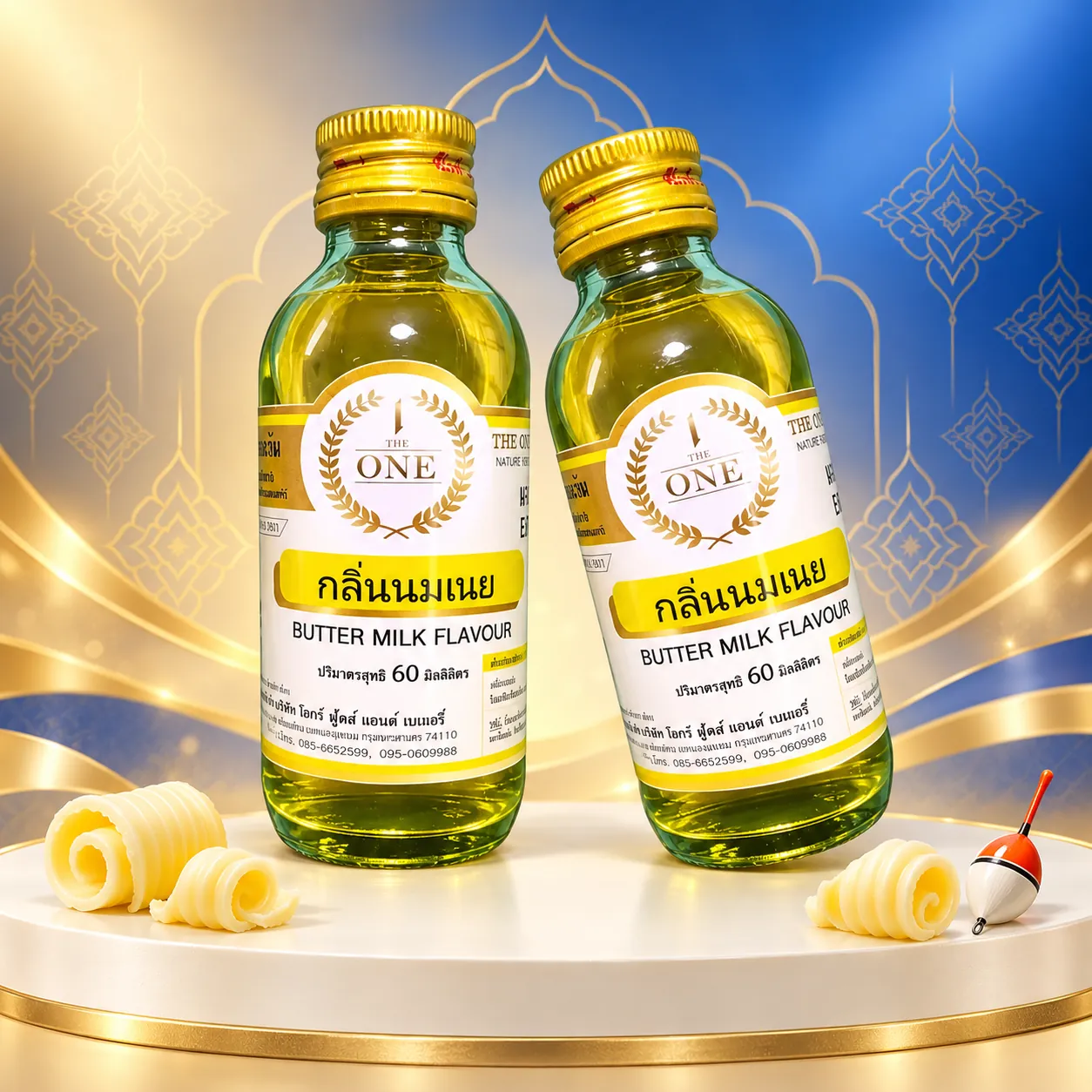 Tinh mùi bơ sữa The One 60ml – ảnh woocommerce Tinh mùi bơ sữa The One 60ml, hai chai, một đứng và một nghiêng trên nền studio với họa tiết gợi phong cách Thái.