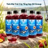Năm chai Tinh Mùi Trái Cây Tổng Hợp SH Group trưng bày bên hồ nước ngọt, phía trước có cốc dung dịch cùng màu.