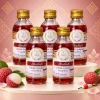 Tinh mùi vải The One 60ml, năm chai cùng loại trên nền studio với họa tiết gợi phong cách Thái.
